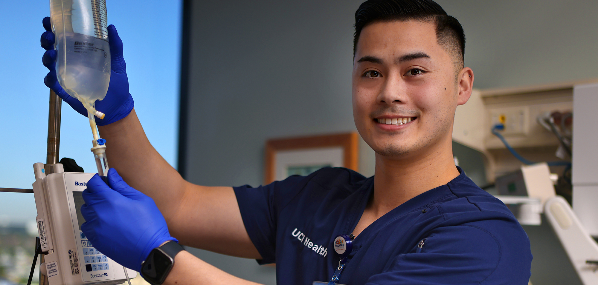 nurse holding an IV bag